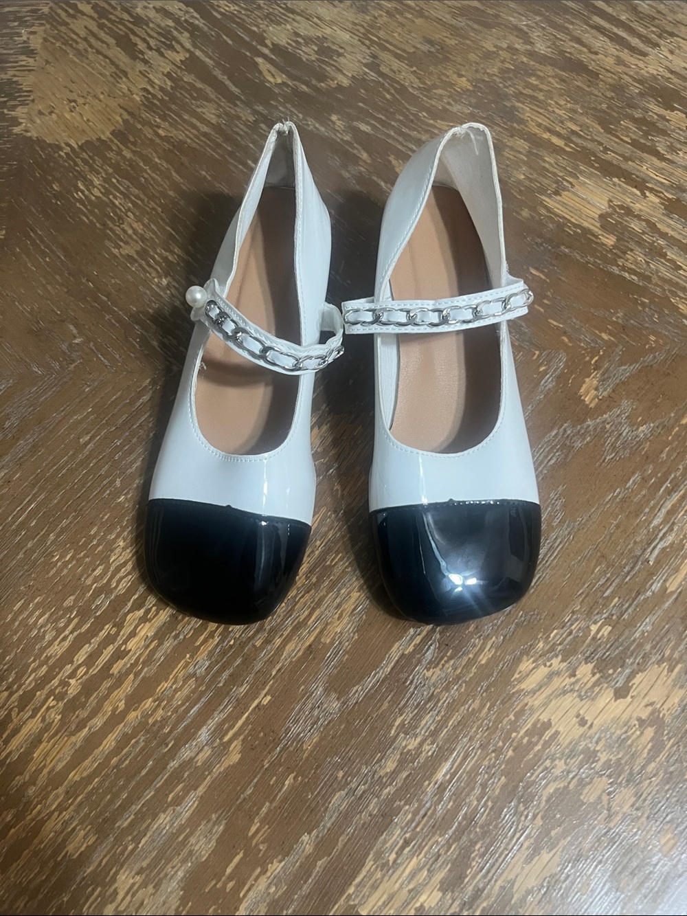 Classic Two-Tone Mary Jane Flats in White and Black